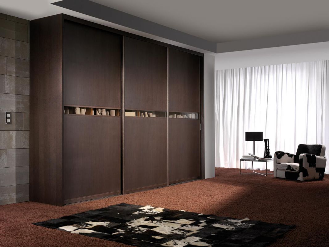 FC152 FRENTE CORREDERO ECO NOGAL TEÑIDO Y CRISTAL TRANSPARENTE. PERFILES NOGAL TEÑIDO