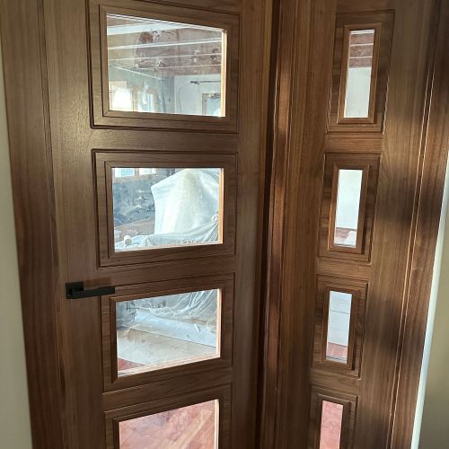 PI76 PUERTA VIDRIERA MOD ARRUI NOGAL