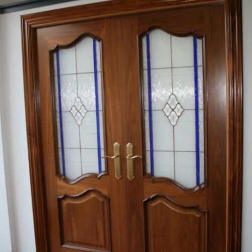 PI12 PUERTA DOBLE NOGAL MODELO 902 CRISTALES EMPLOMADOS
